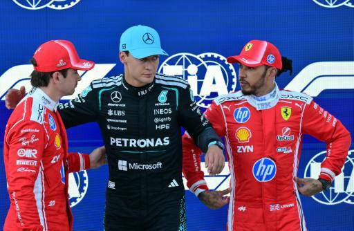 George Russell (centro) después de conseguir la pole position del Gran Premio de Austria de F1, junto a Charles Leclerc (izquierda) y Lewis Hamilton (derecha), segundo y tercero de la sesión. En Spielberg bei Knittelfeld (Austria), el 27 de junio de 2026
