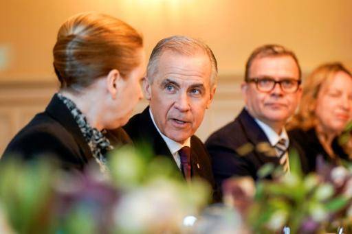 Los primeros ministros de Canadá, Mark Carney, y Dinamarca, Mette Fredriksen, conversan durante la reunión en Oslo el 15 de marzo de 2026