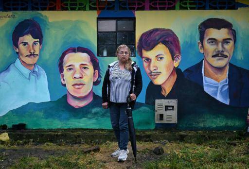 Un mural con los rostros de cuatro presuntas víctimas de desaparición forzada, en un caso que salpica al exciclista colombiano Luis Herrera en Fusagasugá, Colombia, el 1 de febrero de 2026