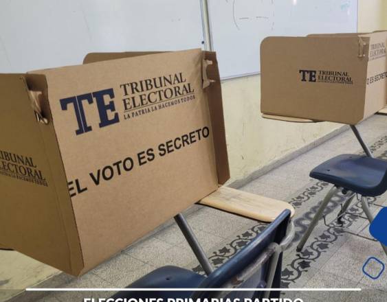 ml | Urnas de votación durante unas elecciones generales.