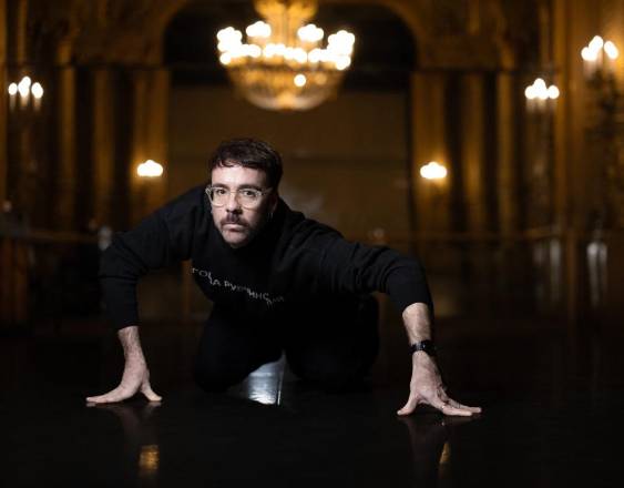 Spanish choreographer Marcos Morau poses during a photo session at the Palais Garnier Opera in Paris on March 11, 2026. (Photo by JOEL SAGET / AFP) / “The erroneous mention[s] appearing in the metadata of this photo by JOEL SAGET has been modified in AFP systems in the following manner: [Morau] instead of [Mauro]. Please immediately remove the erroneous mention[s] from all your online services and delete it (them) from your servers. If you have been authorized by AFP to distribute it (them) to third parties, please ensure that the same actions are carried out by them. Failure to promptly comply with these instructions will entail liability on your part for any continued or post notification usage. Therefore we thank you very much for all your attention and prompt action. We are sorry for the inconvenience this notification may cause and remain at your disposal for any further information you may require.”