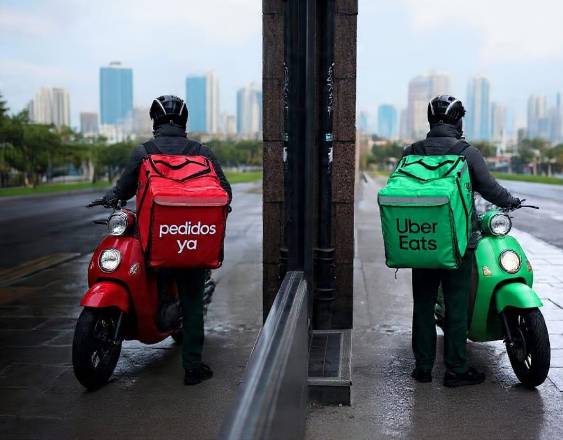 Uber compra a Delivery Hero, dueña de PedidosYa, por $14.800 millones