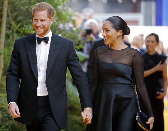El príncipe Enrique de Gran Bretaña, duque de Sussex (izq.), y Meghan, duquesa de Sussex.