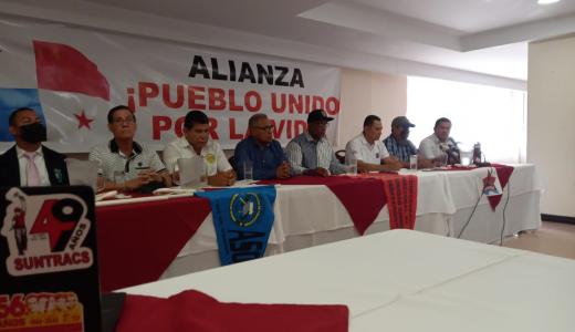 ML | Líderes sindicalistas reunidos en conferencia de prensa.